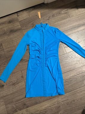 SKIMS Long Sleeve Ruched Front Dress in bright blue. Turquoise